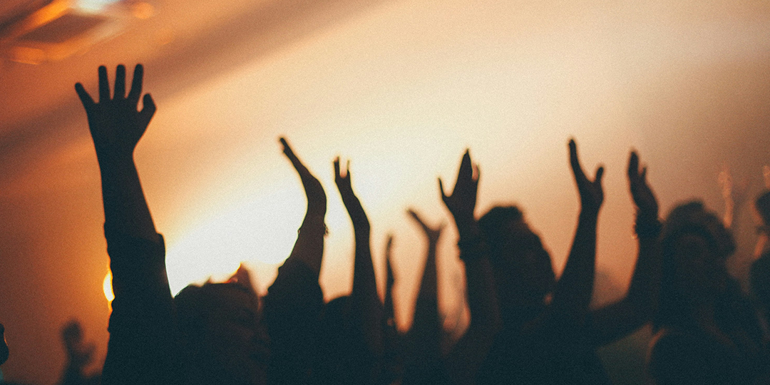 Image of hands raised in worship