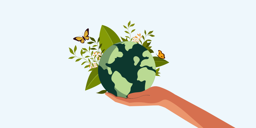 illustration of a hand holding the earth with greenery and butterflies