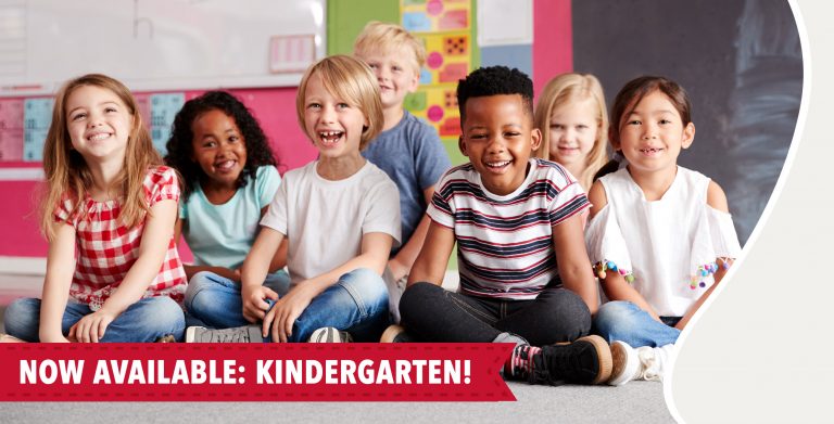 image of happy kids in a classroom with text that says "Now Available: Kindergarten!"