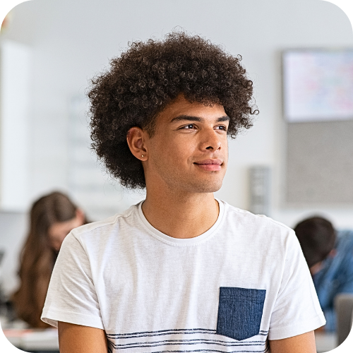 Student thinking at his desk