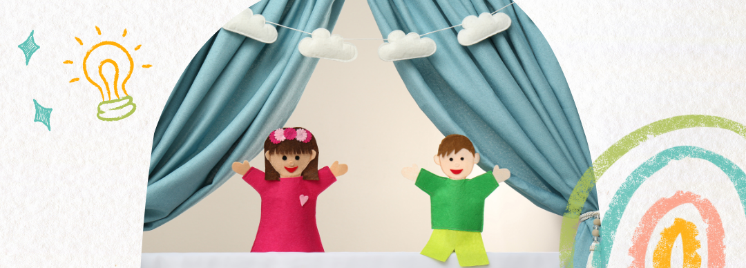 Image of a puppet show with chalk doodles